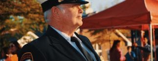 older veteran in parade uniform