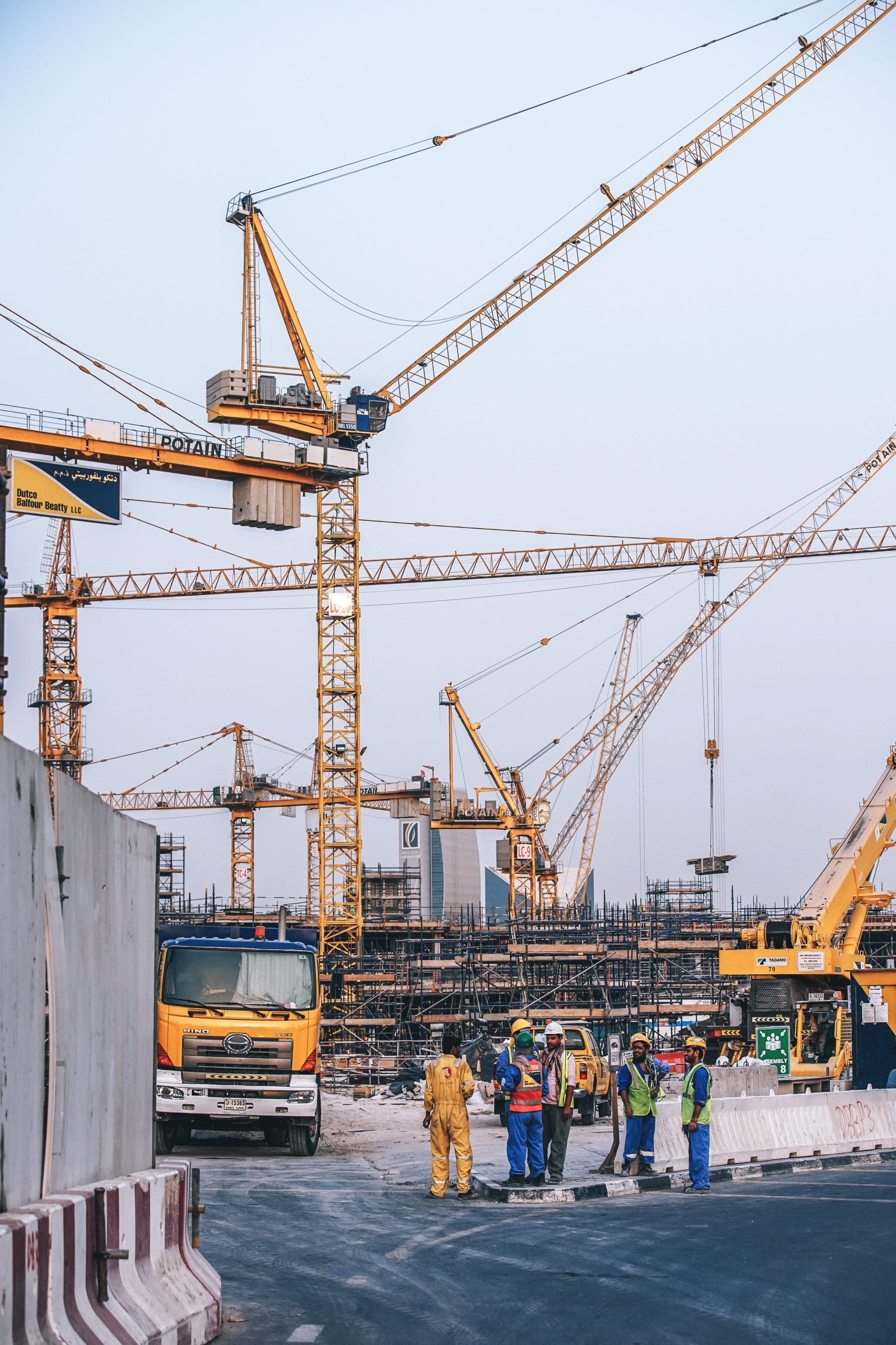 a group of construction workers in a construction zone