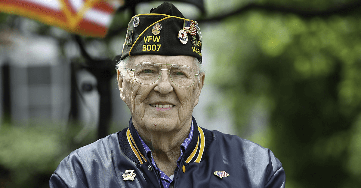 elderly military veteran with vfw hat