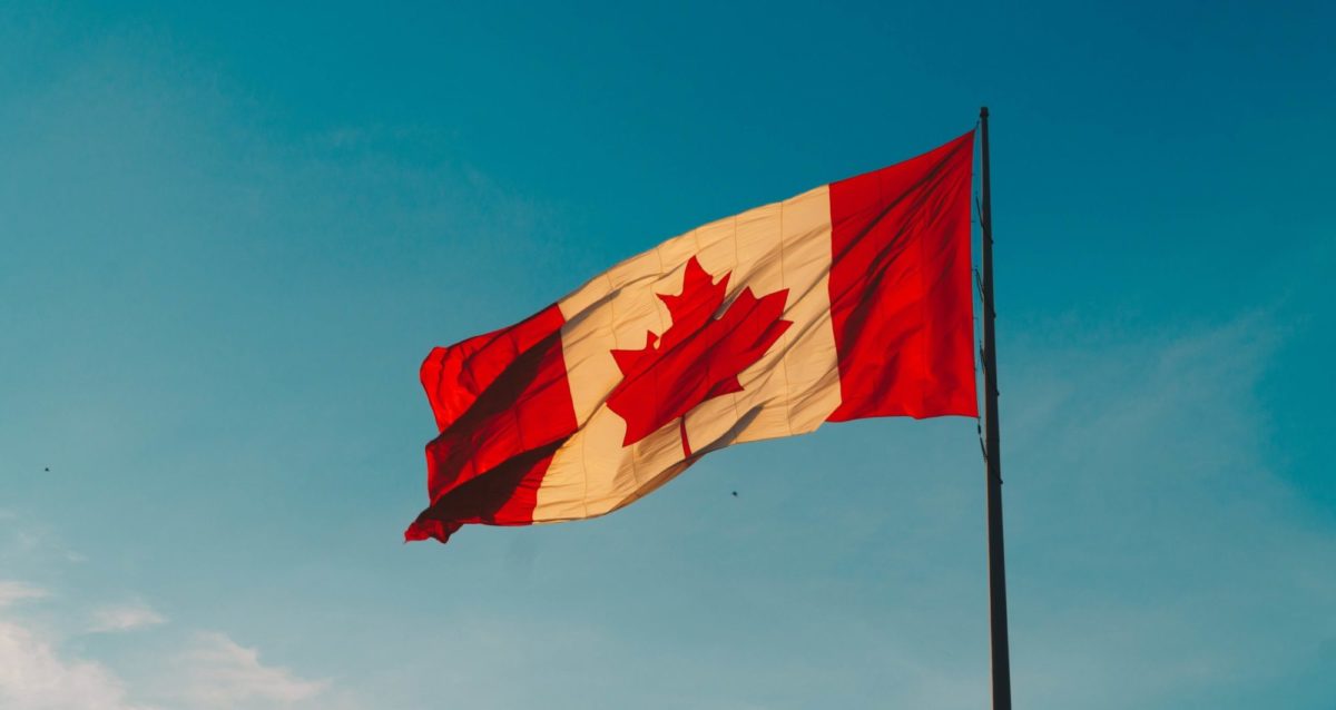 close up of canadian flag flying in the wind