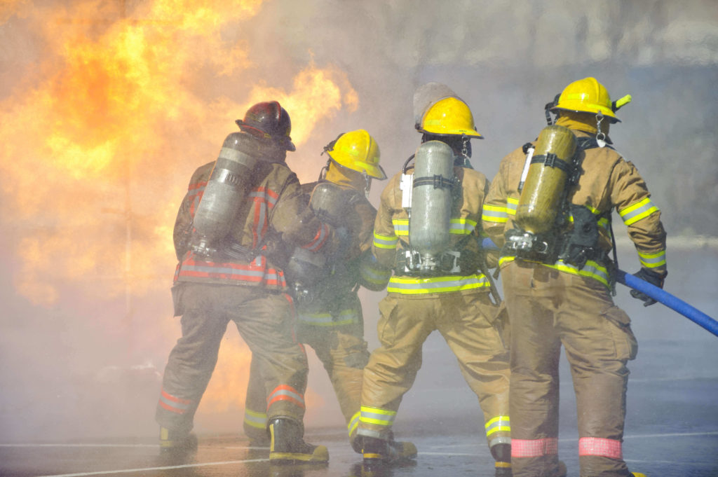 Firefighters putting out a fire