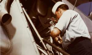 An aviation mechanic works on a plane, not realizing he may be at risk of asbestos exposure
