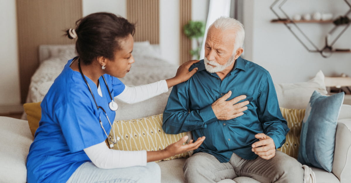 Patient describes symptoms to nurse