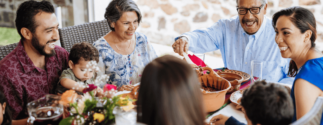 A family gathers for dinner around the holidays