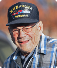 An older U.S. veteran smiling