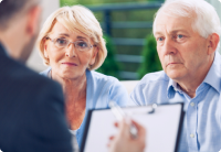 Senior Couple Talking with a Lawyer