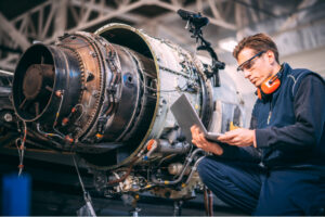 aircaft mechanic working doing repair work