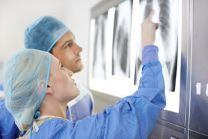 Doctors Looking at a Lung X Ray