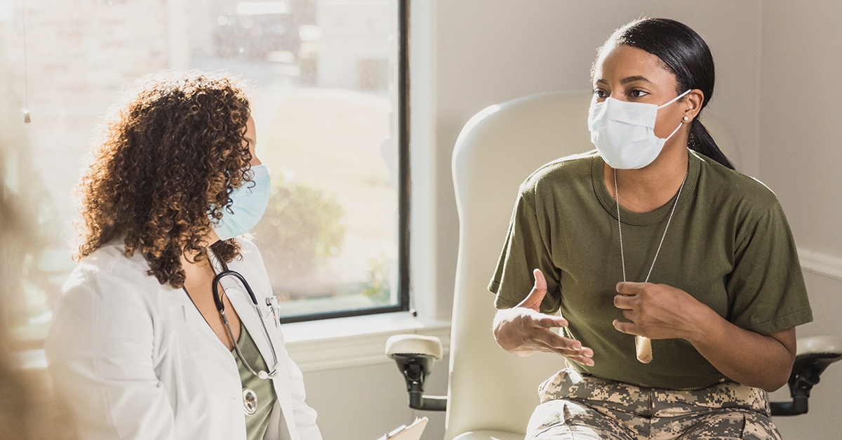 Veteran speaking with doctor