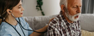 nurse checks veteran for symptoms