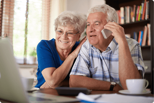 Couple making a telephone call